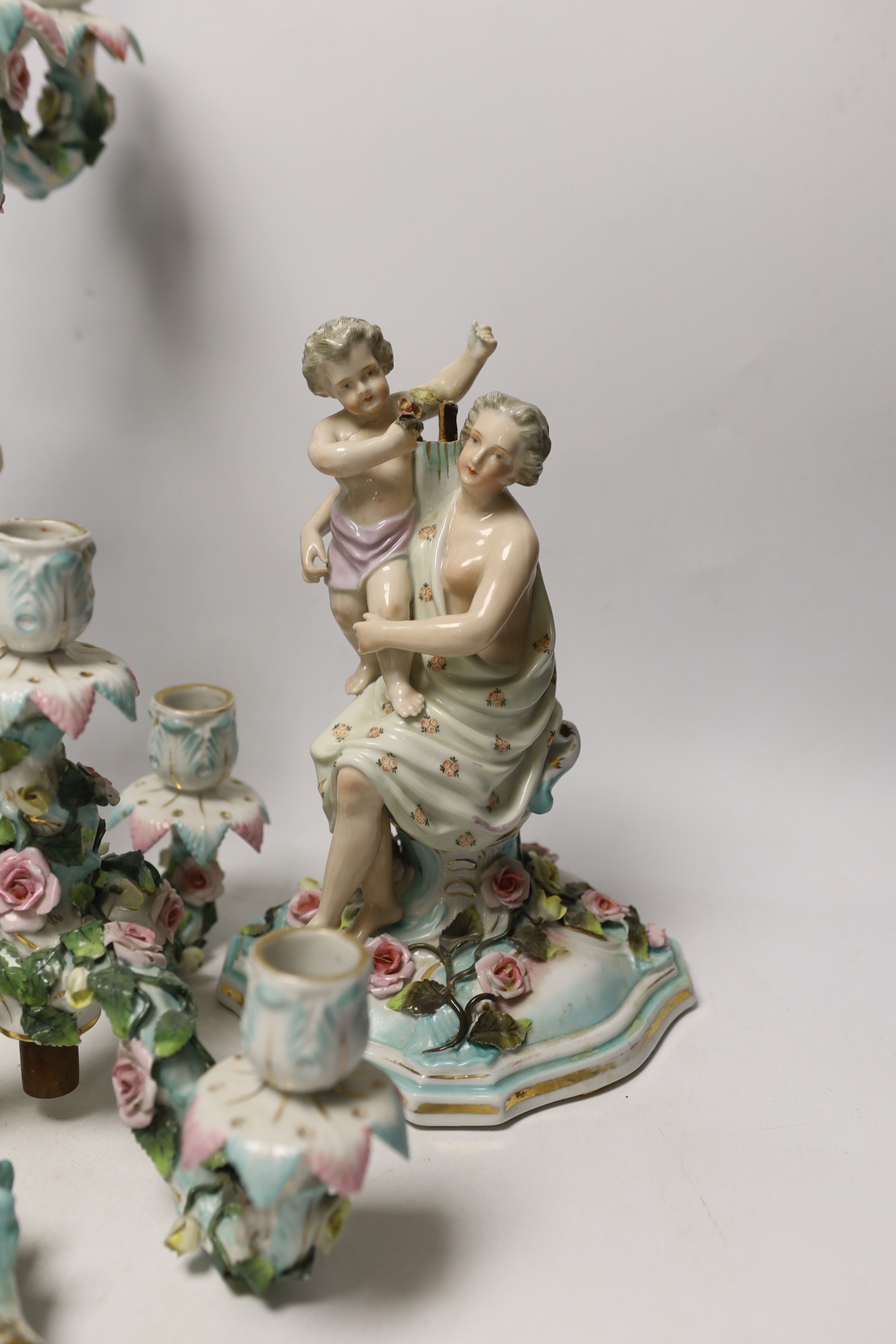 A pair of Sitzendorf figural candelabra, 46cm